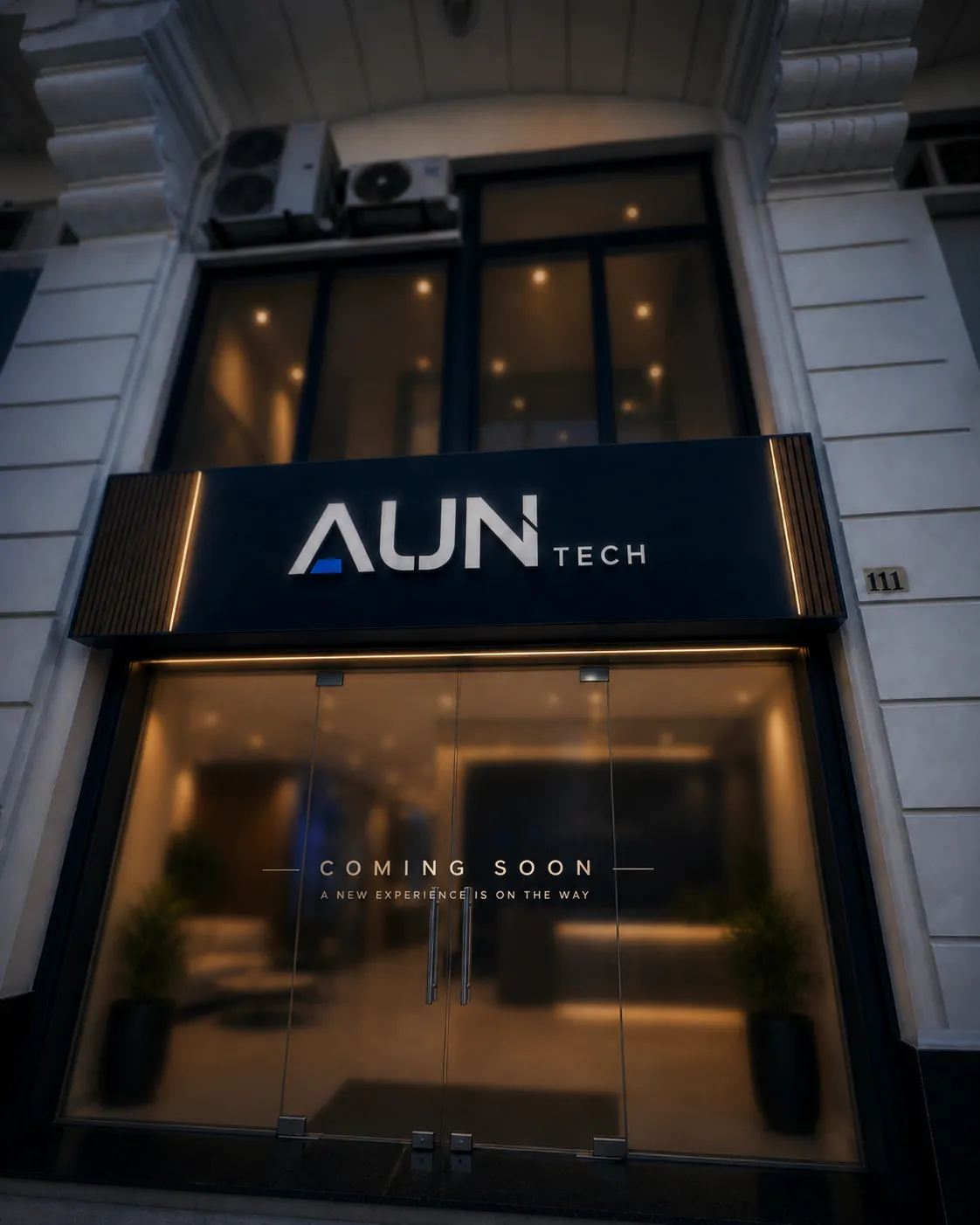 Blurred outside view of the AUN Tech office location under preparation.